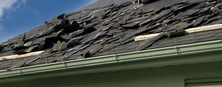 cleaning old roof shingles off the roof