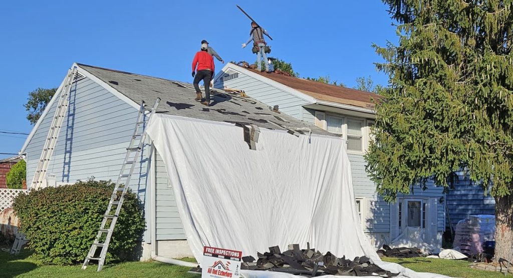 tearing off the roof on memorial dr., new castle, de