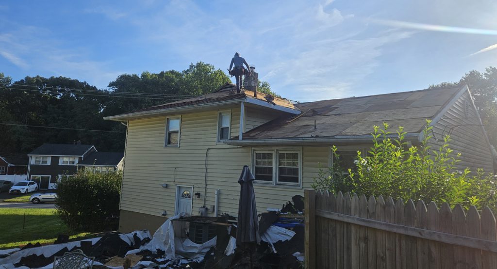 Tearing off the roof on Parma Ave. New Castle, DE