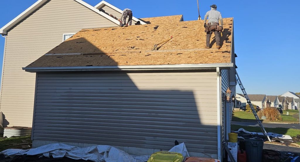 Tearing off old roof in Middletown, DE