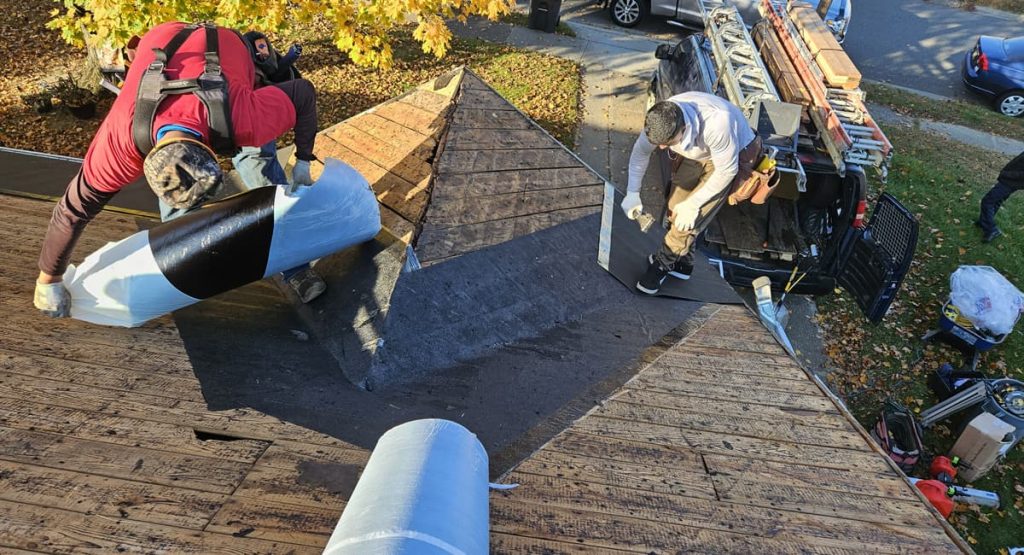Tearing off old roof in Newport, DE