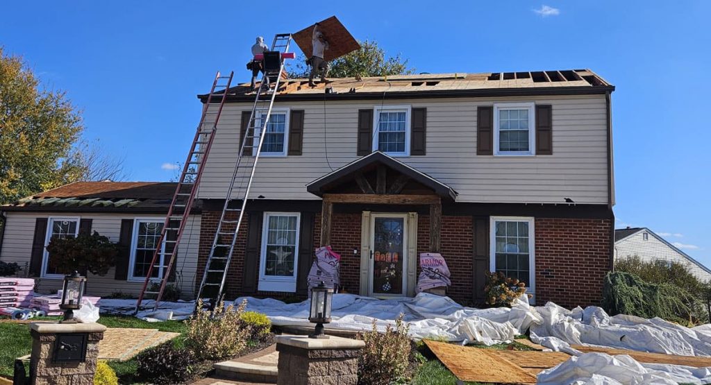 tearing off old roof before installing new Sedona Canyon roof in New Castle, DE
