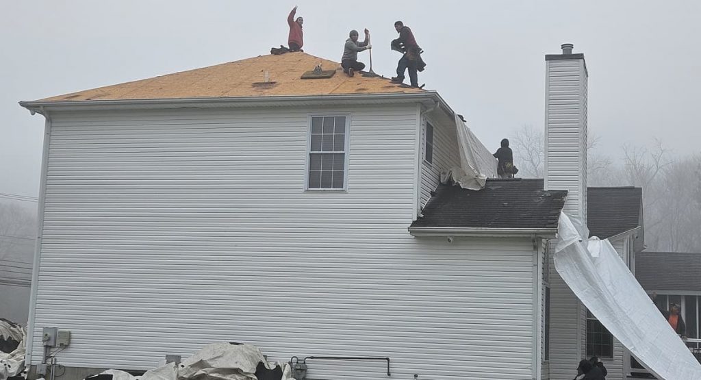 Tearing off the old roof in Bear, DE