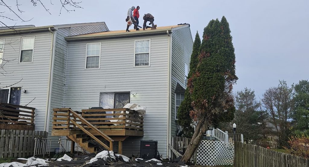 Tearing off old roof in Bear, DE
