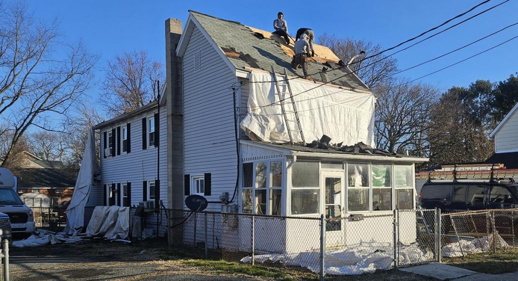 tearing off old roof in Middletown, DE