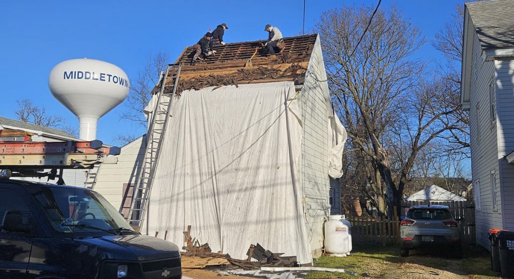 tearing off old 1900 roof in Middletown, DE