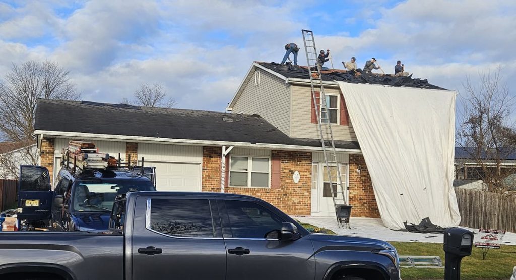 Tearing off old roof on Courtland Circle in Bear, DE
