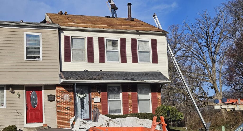 tearing off old roof in Newark, DE