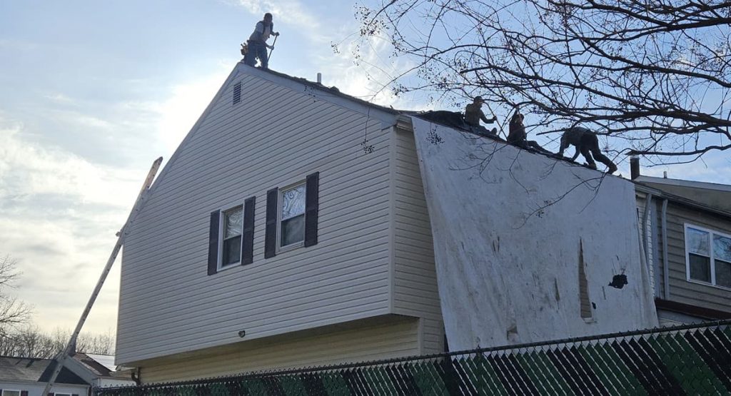 tearing off old roof in Newark, DE