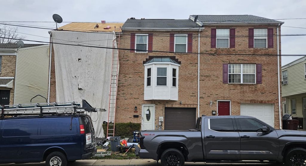 tearing off old roof in Wilmington, DE