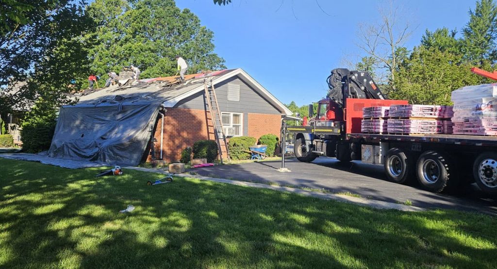 Tearing off old roof in Middletown, DE