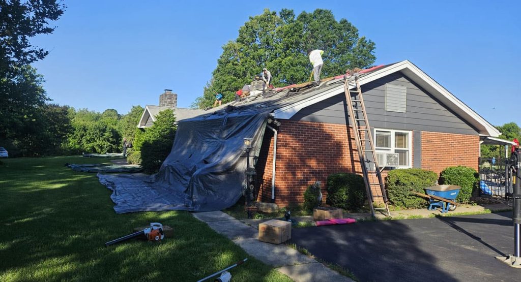 Tearing off old roof in Middletown, DE