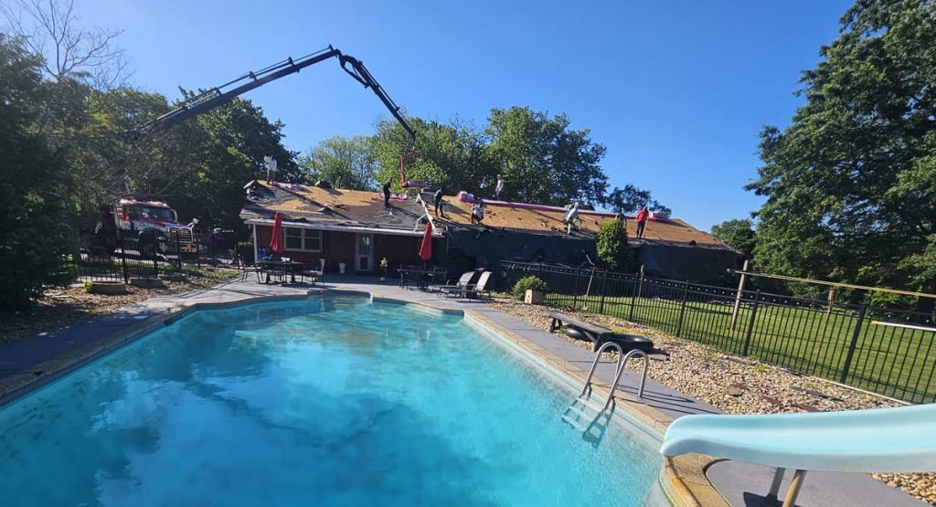 Tearing off old roof in Middletown, DE