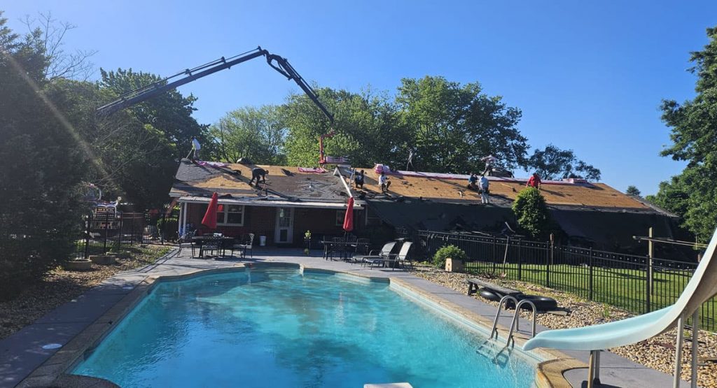 Tearing off old roof in Middletown, DE