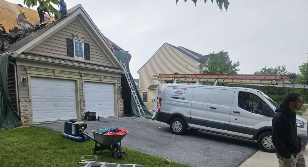 Tearing off old roof in Middletown, DE
