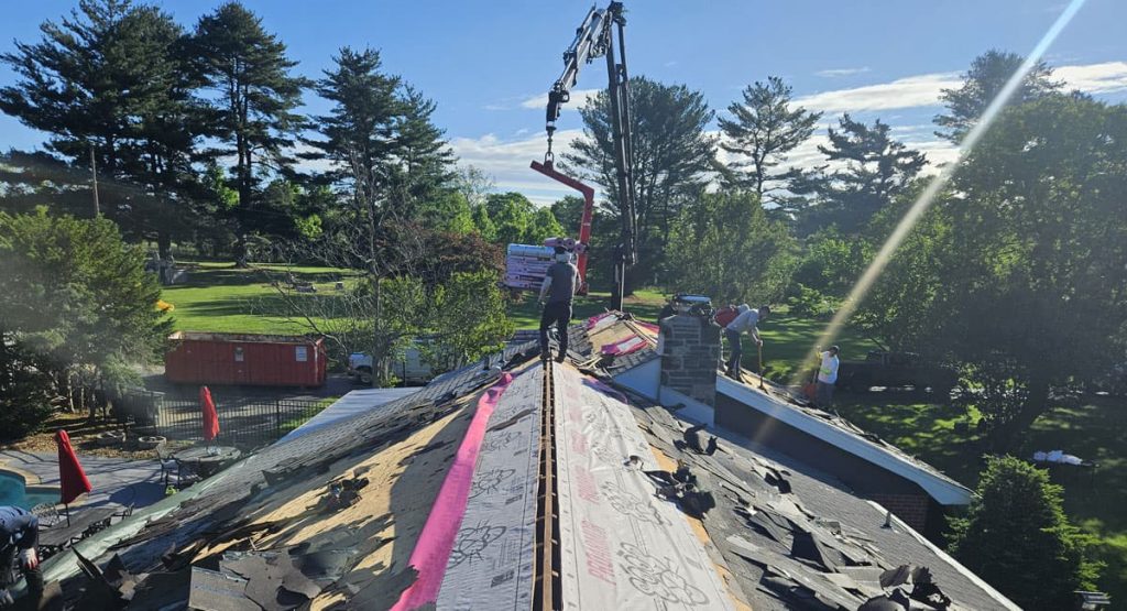 Tearing off old roof in Middletown, DE