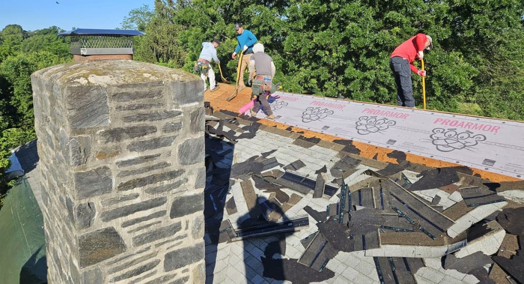Tearing off old roof in Middletown, DE