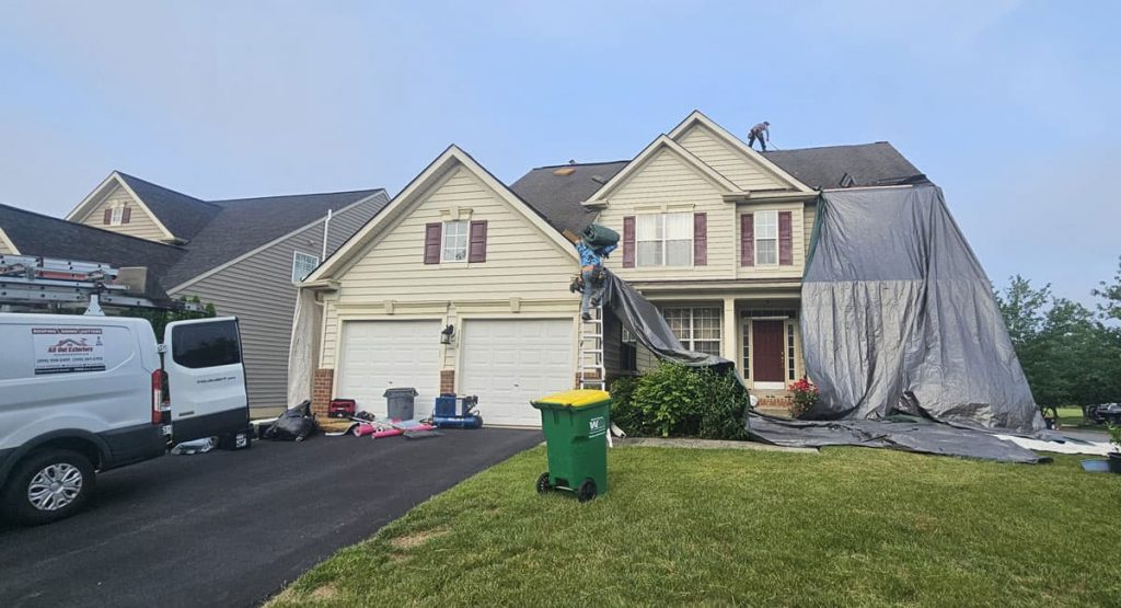 Tearing off old roof in Middletown, DE
