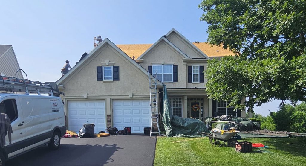 Tearing off old roof in Middletown, DE