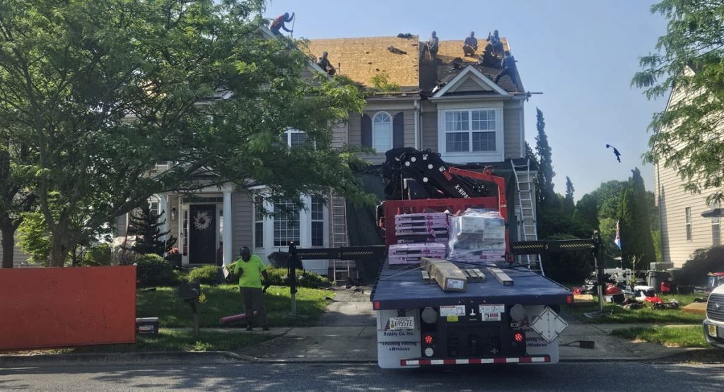 Tearing off old roof in Middletown, DE