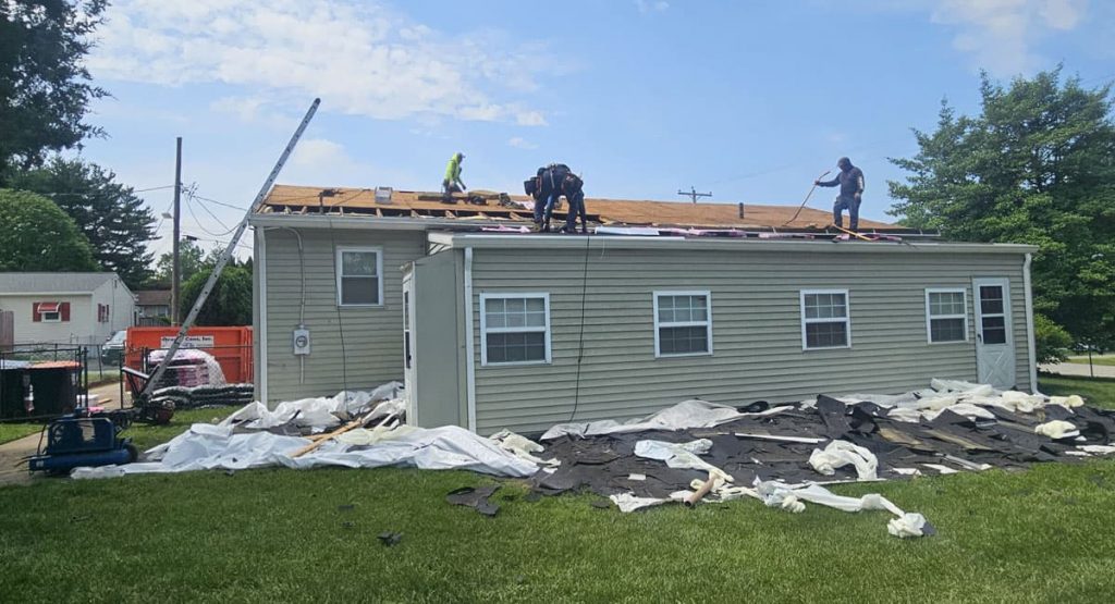 Tearing off old roof in Middletown, DE