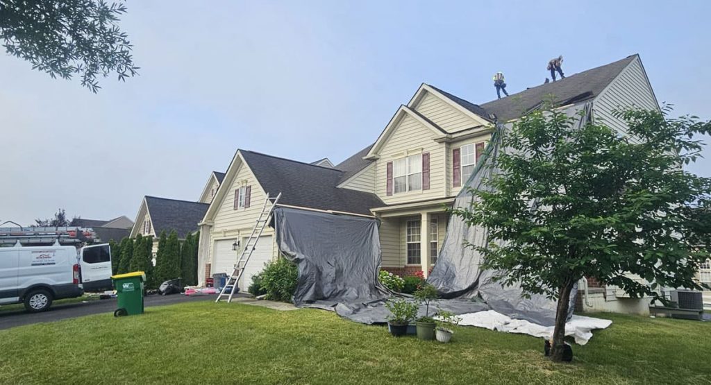 Tearing off old roof in Middletown, DE