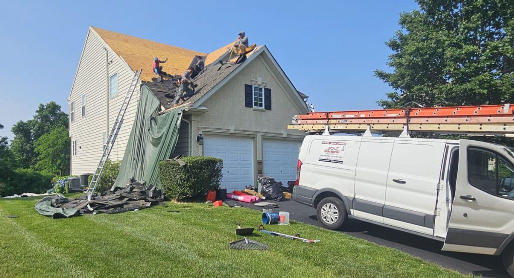 Tearing off old roof in Middletown, DE