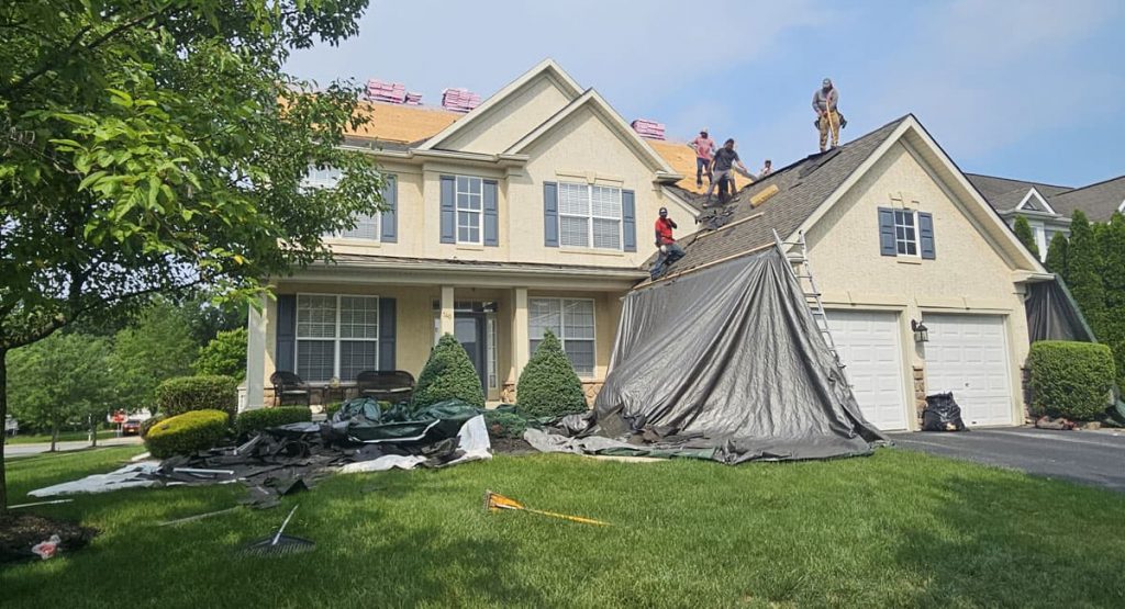 Tearing off old roof in Middletown, DE