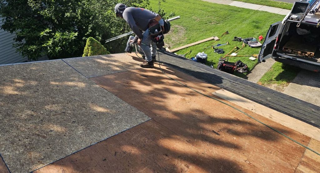 Tearing off old roof in Wenonah, NJ