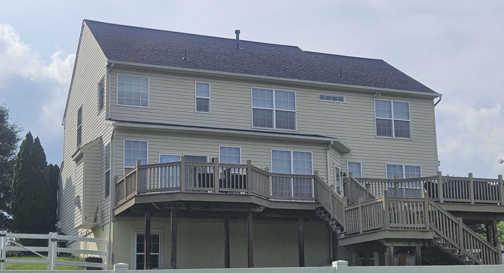 Tearing off old roof in Middletown, DE