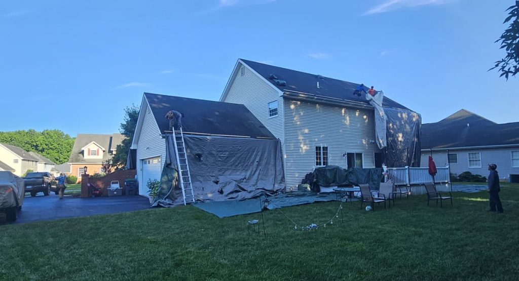 Tearing off old roof in Bear, DE