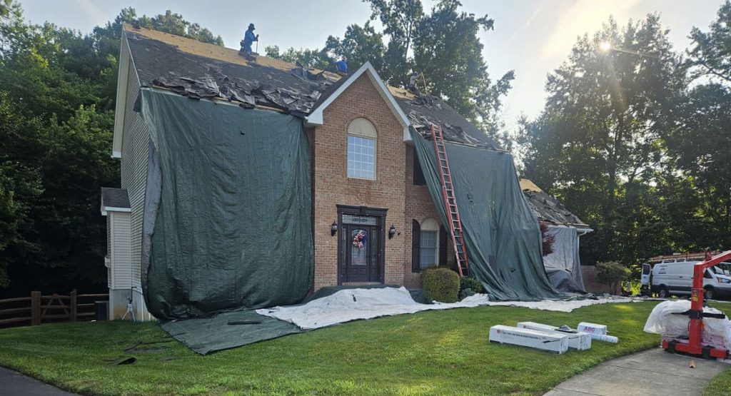 Tearing off old roof in Bear, DE