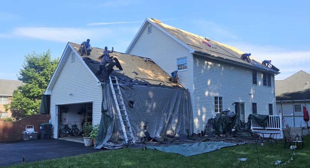 Tearing off old roof in Bear, DE