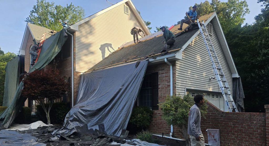 Tearing off old roof in Bear, DE
