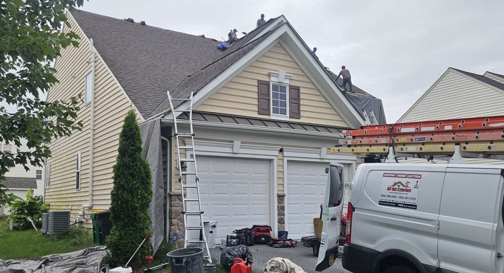 Tearing off old roof in Middletown, DE