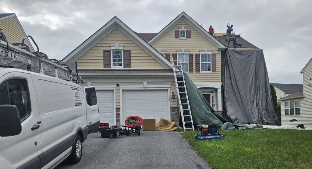 Tearing off old roof in Middletown, DE