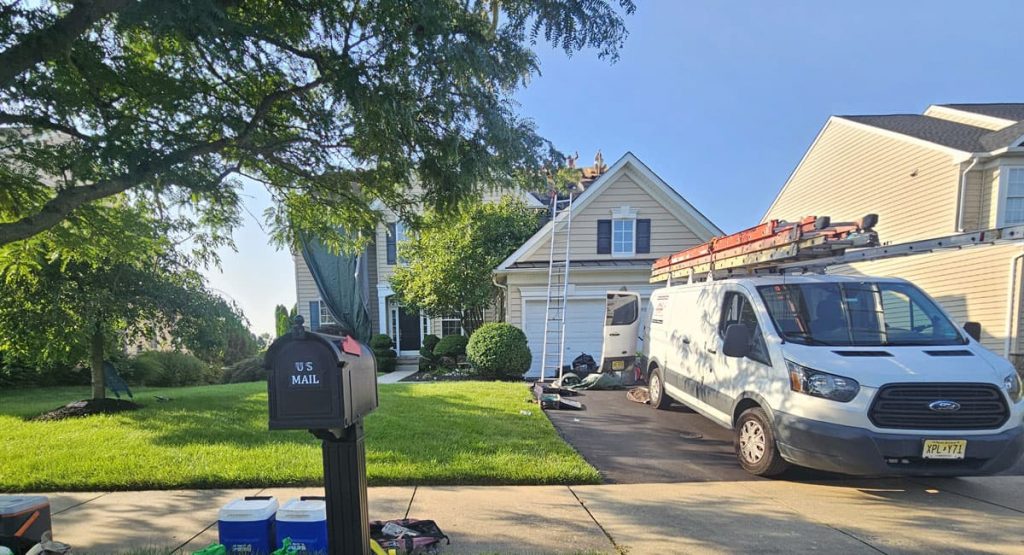 Tearing off old roof in Middletown, DE