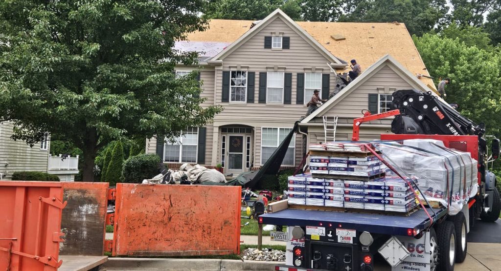 tearing off the old roof in Middletown, DE