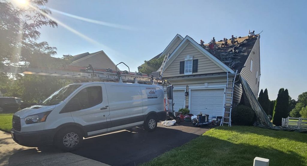 Tearing off old roof in Middletown, DE