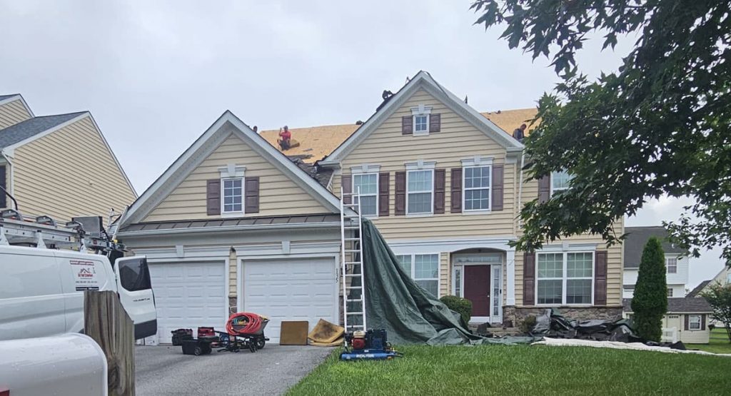 Tearing off old roof in Middletown, DE