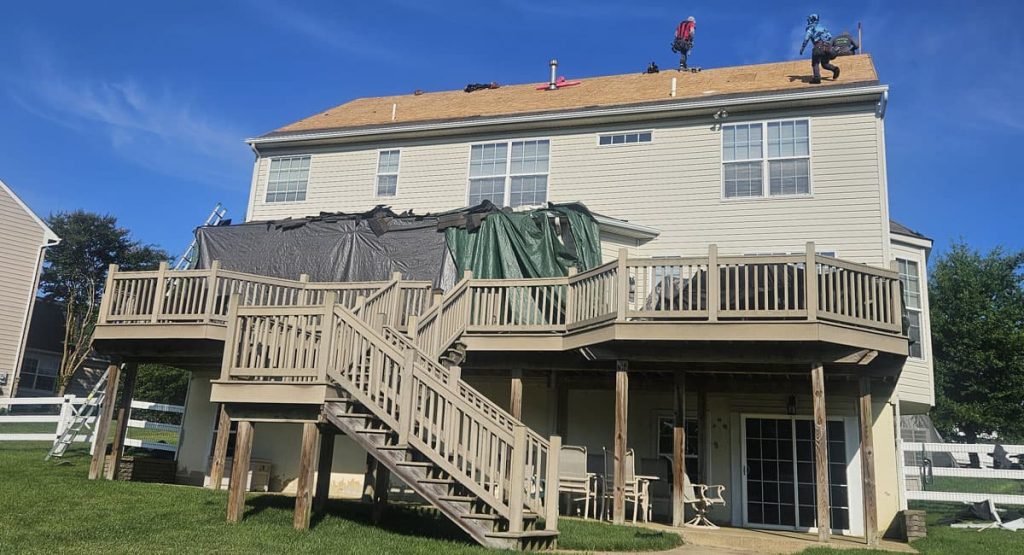 Tearing off old roof in Middletown, DE