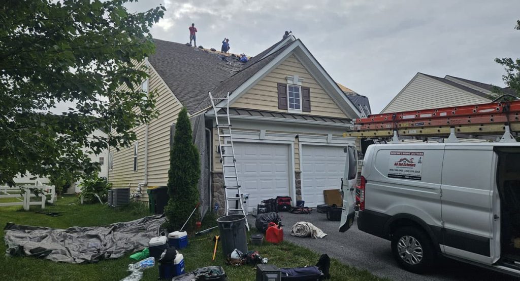 Tearing off old roof in Middletown, DE