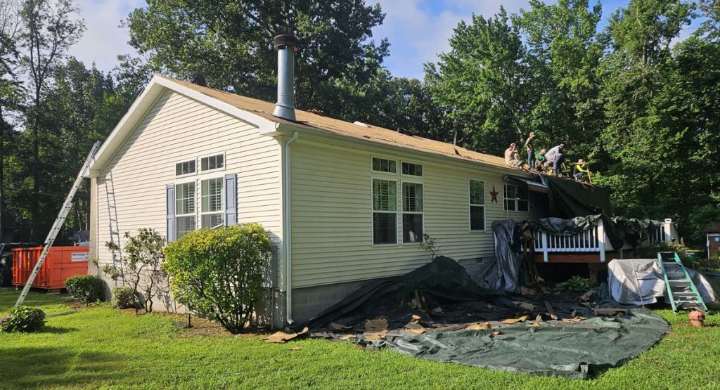 Tearing off the old roof in Townsend, DE