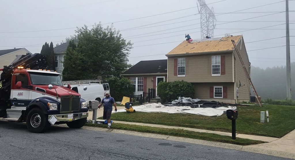 Tearing off the old roof in Newark, DE