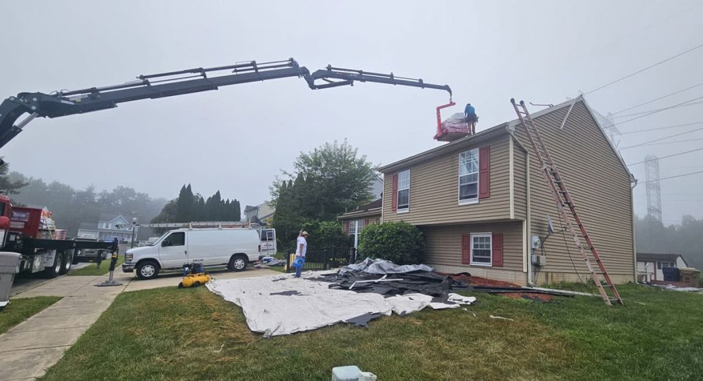 Tearing off the old roof in Newark, DE