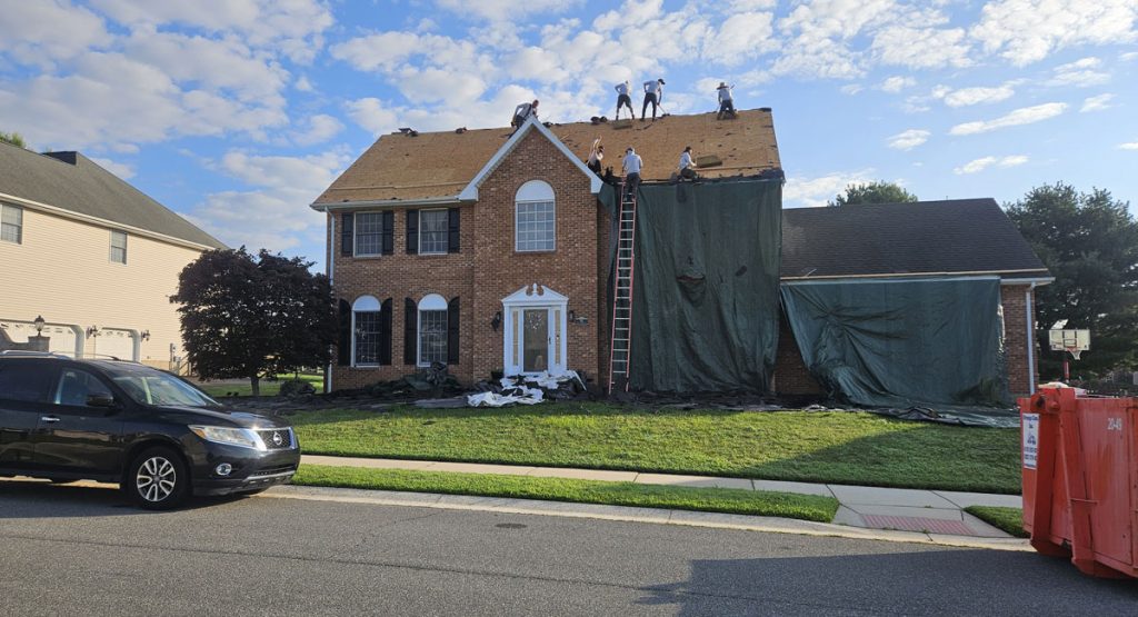 Tearing off the old roof in Bear, DE
