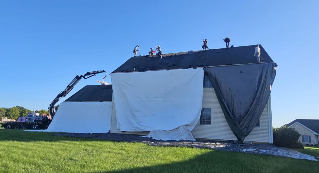Tearing off the old roof in Bear, DE