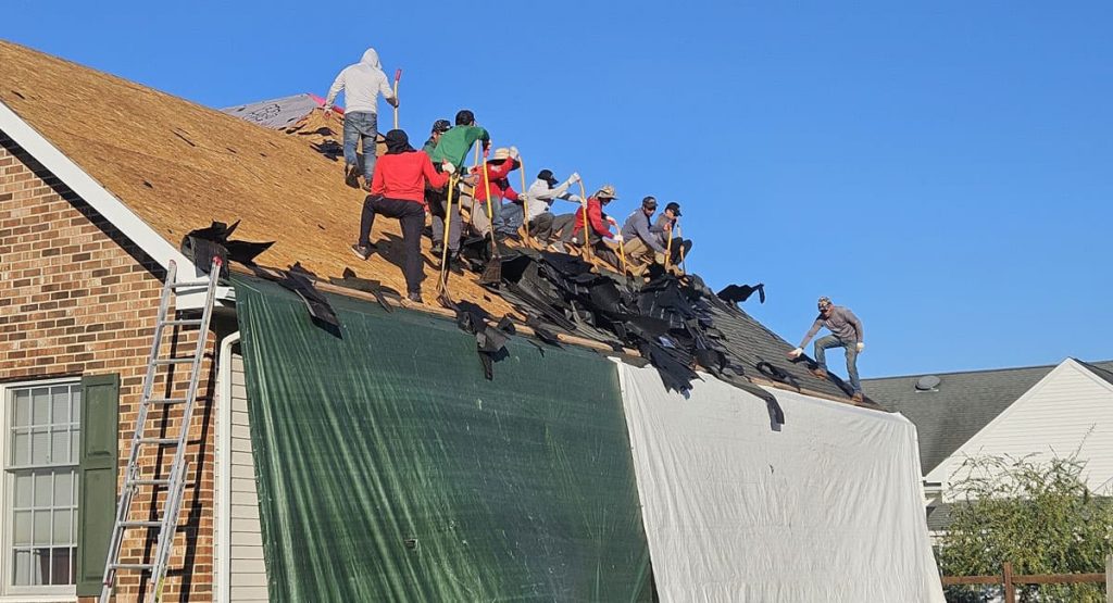 Tearing off the old roof in Bear, DE