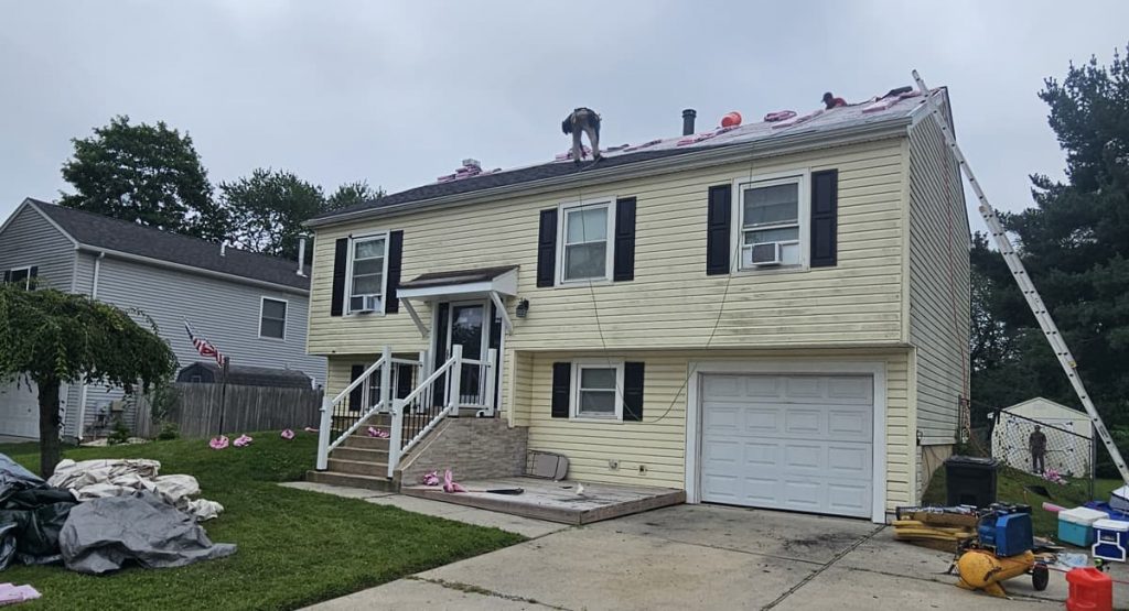 Tearing off old roof in Newark, DE