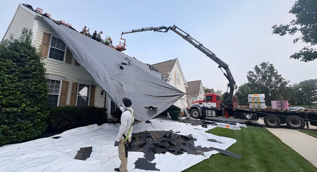 Tearing off old roof in Middletown, DE